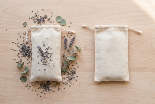 Two natural shoe deodoriser sachets, one with dried lavender and eucalyptus, one plain unscented